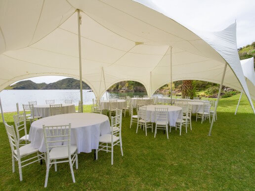 Marquee and tables on beach